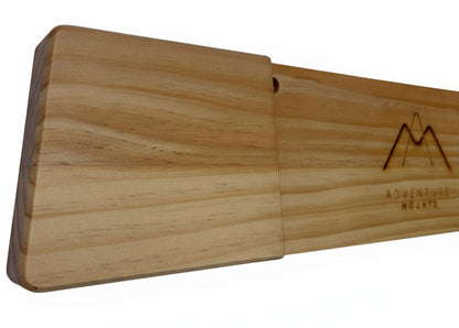 Close up of the bezel edge and clear coat on the Powder Chaser premium wood snowboard mount product by Adventure Mounts.